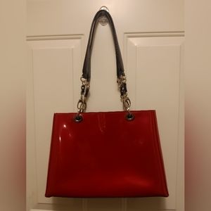 Beijo Red Apple patent leather bag.